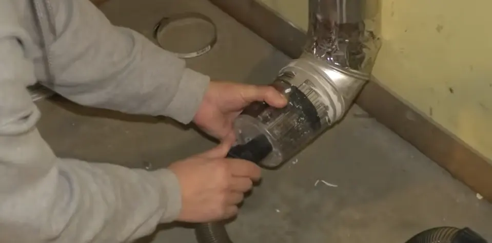 Dryer vent duct interior — lint buildup requiring professional cleaning to prevent fire hazard