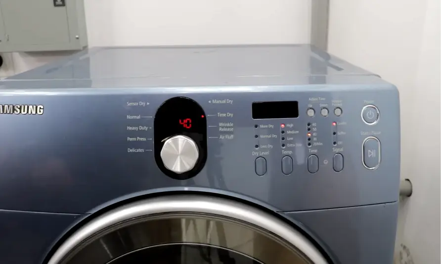 Dryer stopping mid-cycle — technician diagnosing thermal cutoff or door switch failure